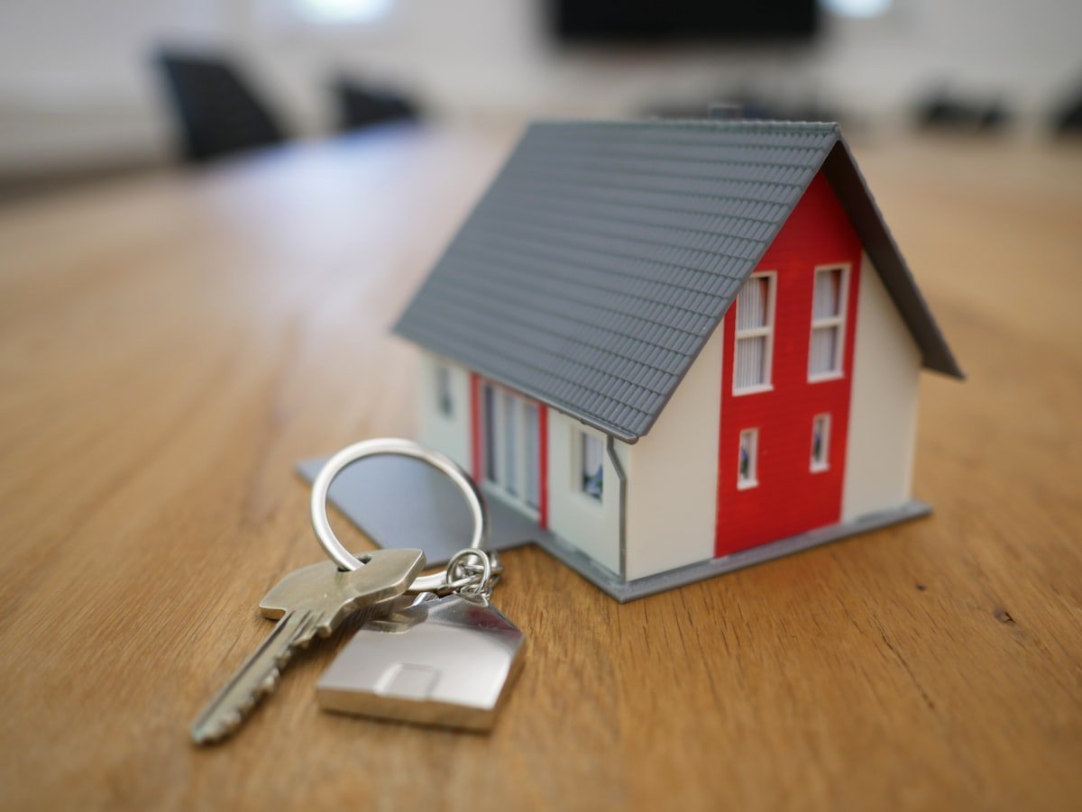 Happy clients receiving keys to their new home